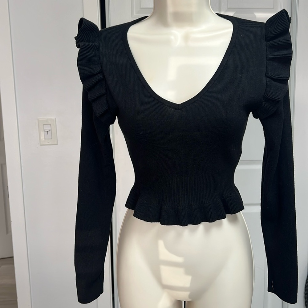 Black flurry sleeve knit top